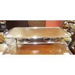 A mid 20thC silver plated Food Warmer Hot Plate, by Harrods, London. with two spirit burners and