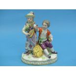 A Meissen porcelain group of two Children, she standing holding a mandolin, he seated on sheafs of