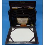 An Edwardian rosewood Stationery Box, with scroll and foliate marquetry decoration, the hinged lid