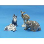 Three Royal Copenhagen porcelain animals: Bear, 2841; Cat, 115; and Piglets, 683, together with Bing