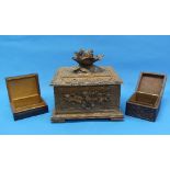 An early 20th century German Black Forest carved wooden Cigar Box, the hinged lid with bird