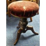 An Edwardian mahogany upholstered Piano Stool, with green floral upholstery, 21½in (55cm) wide x