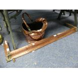 A copper Fire Fender, 46in (112cm) wide x 11in (28cm) deep x 3in (8cm) high, together with a