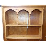 A 20thC pine wall Hanging Shelves, comprising two shelves, with turned supports, 31in (78cm) wide