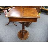 An antique mahogany Ladies Work Box, with a hinged lid enclosing a vacant compartment, on a pedestal