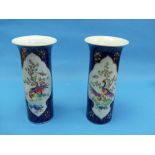 A pair of 20thC continental Sleeve Vases, decorated in the Famille Rose style, depicting exotic