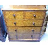 A Victorian mahogany Chest of Drawers, comprising two short drawers above three long with turned