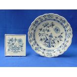 A Meissen porcelain blue and white Onion pattern Dish, with wavy border, 12¼in (31cm) diameter,