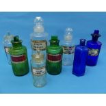 A small collection of antique Chemist / Apothecary Bottles, including a set of clear bottles of