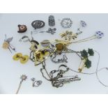 A quantity of silver and Costume Jewellery, including brooches, a belt, a rolled gold hinged bangle,