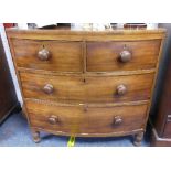 A 19thC mahogany bowfront Chest of Drawers, two short over two long, raised on turned legs, 35½in