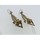 A pair of Mid Victorian Etruscan Revival Drop Earrings, in gilt metal (pinchbeck?) formed of