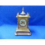 A late 19th century French Samuel Marti gilt-brass Mantel Clock, the case with foliate engraved