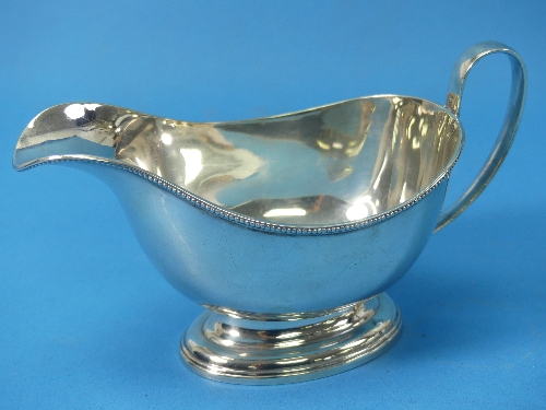 A George V silver Sauce Boat, by Henry Clifford Davis, hallmarked Birmingham, 1919, of traditional