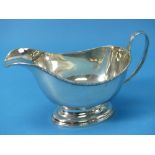A George V silver Sauce Boat, by Henry Clifford Davis, hallmarked Birmingham, 1919, of traditional