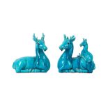 A PAIR OF 20TH CENTURY CHINESE TURQUOISE-GLAZED DEER.