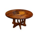 AN UNUSUAL METAMORPHIC COFFEE / DINING TABLE WITH YING YANG SYMBOL