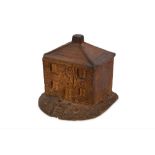 A 19/20TH CENTURY STONEWARE MONEY BOX IN THE FORM OF A COTTAGE