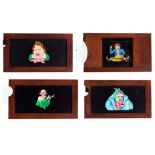 A GROUP OF FOUR HAND PAINTED MAHOGANY MAGIC LANTERN SLIPPING SLIDES