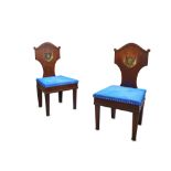 FROM THE COLLECTION OF THE LATE SIR DAVID TANG: A PAIR OF EARLY 20TH CENTURY MAHOGANY HALL CHAIRS WI