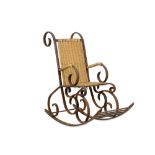 AN EARLY 20TH CENTURY MINIATURE WROUGHT IRON ROCKING CHAIR