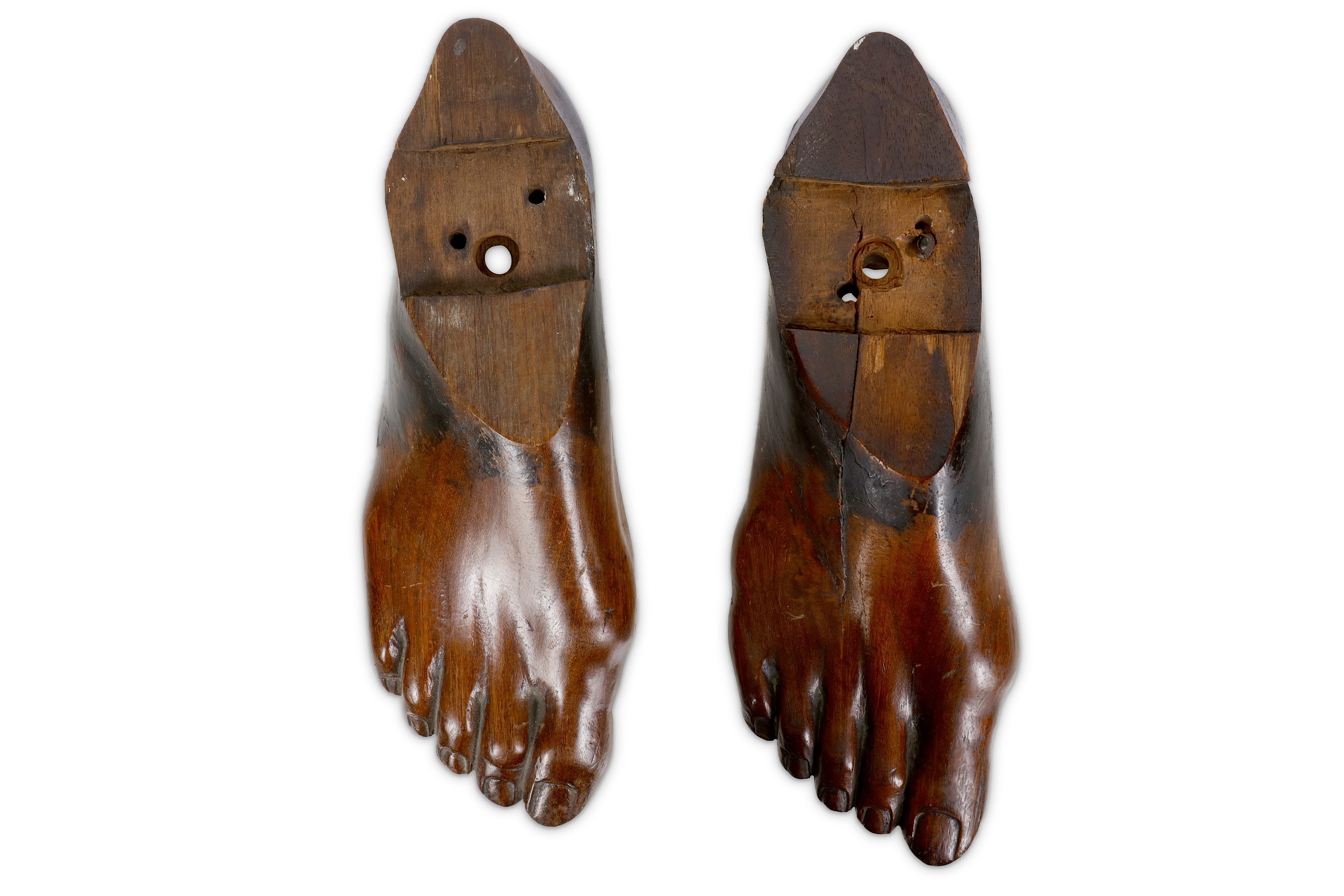 TREEN: A PAIR OF 19TH CENTURY CARVED FRUITWOOD RIGHT FEET - Image 2 of 2