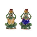 A PAIR OF 20TH CENTURY JAPANESE GLAZED CERAMIC CANDLESTICKS MODELLED AS FROGS