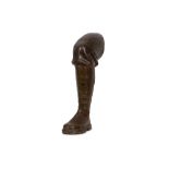 AN EARLY 20TH CENTURY PAPIER MACHE MODEL OF A WW1 SOLDIER'S LEG