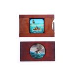 A GROUP OF SEVEN MAHOGANY HAND PAINTED MAGIC LANTERN SLIDES