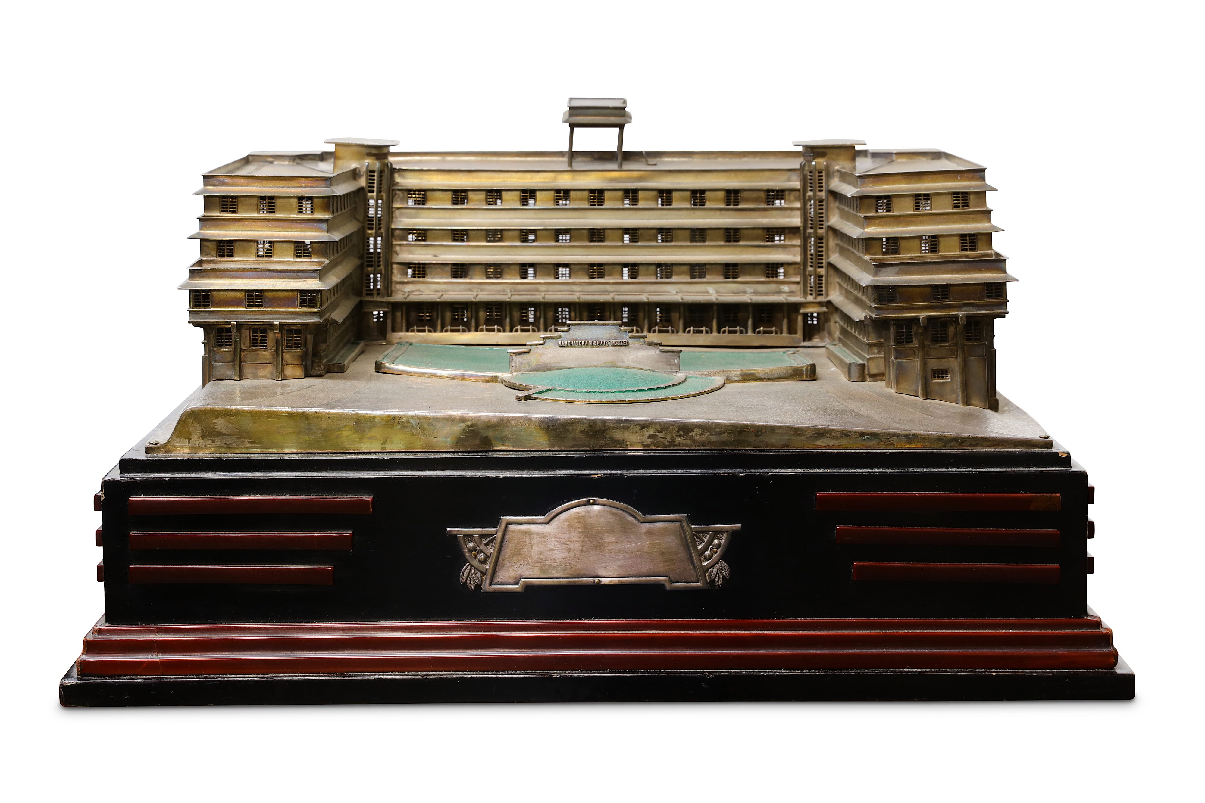 AN UNUSUAL INDIAN SILVER ARCHITECTURAL MODEL OF THE ART DECO RAMGHANDRAM BHATT HOTEL