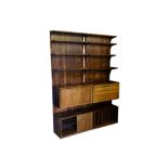 In the style of POAL HUNDEVAAD: A Danish 1960s rosewood shelving unit