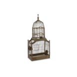 A late 19th to early 20th century birdcage, made from wire and wood, with a central domed cupola