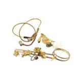 A pair of cast brass swan design bathroom fittings to include taps and a shower fitting each