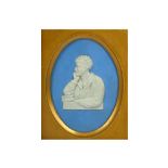 A SMALL OVAL WEDGWOOD PORCELAIN BLUE AND WHITE BUST OF LORD BYRON