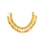 A fringe necklace and earring suite