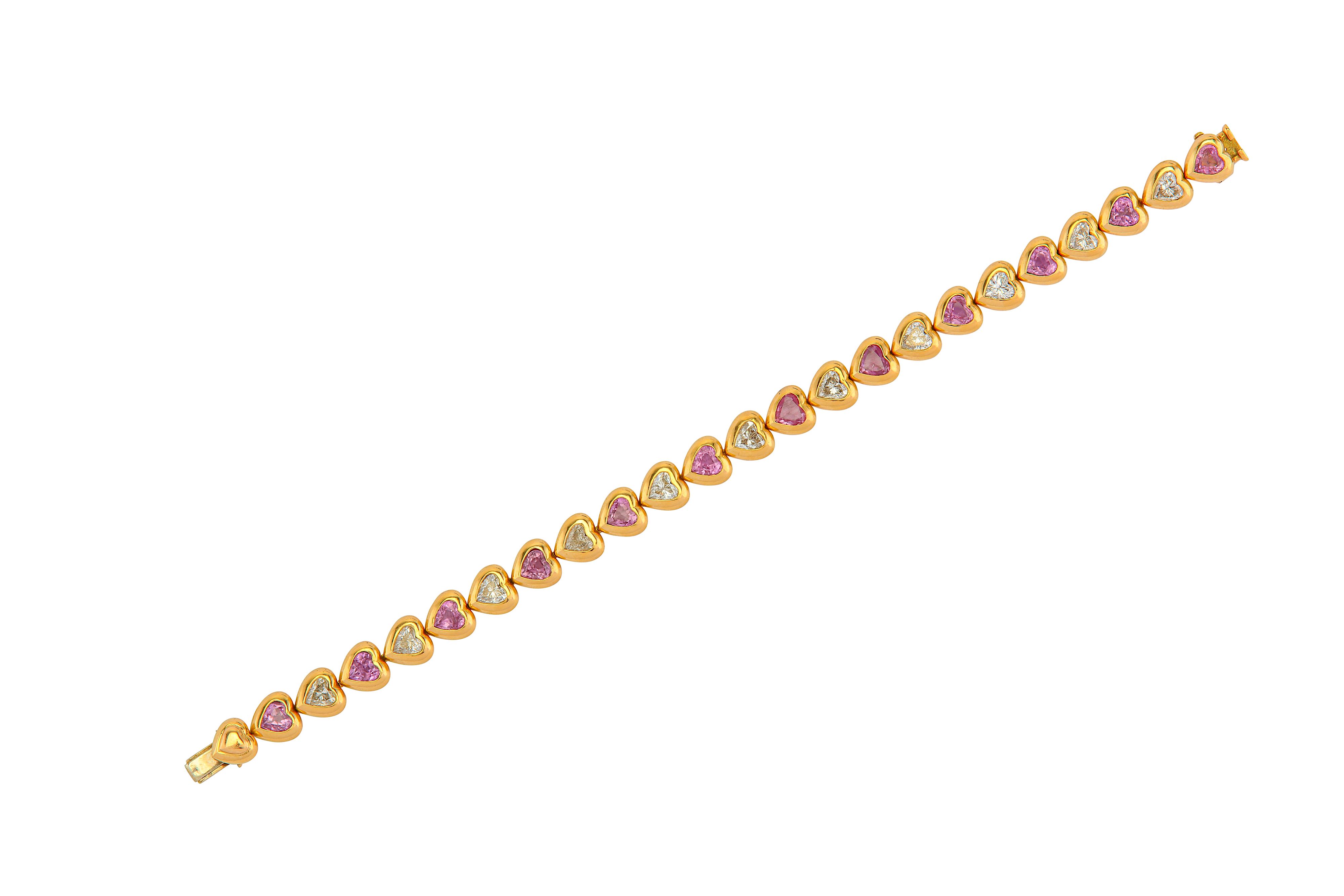 A diamond and pink sapphire line bracelet