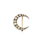 A diamond and half-pearl crescent brooch, circa 1900