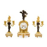 AN EARLY 20TH CENTURY FRENCH GILT BRONZE AND WHITE MARBLE CLOCK GARNITURE DECORATED WITH CUPIDS