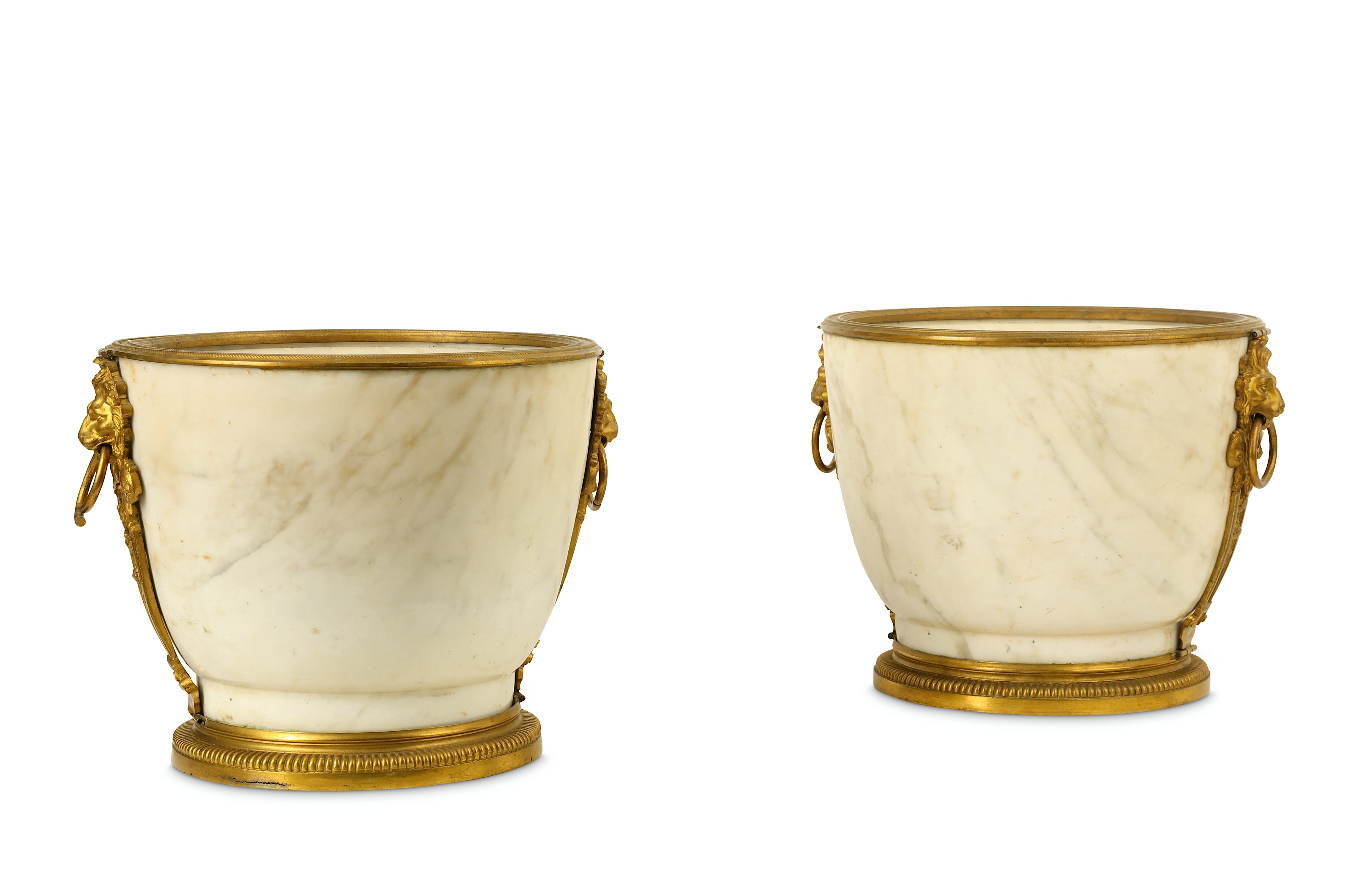 A PAIR OF 19TH CENTURY FRENCH REGENCE STYLE MARBLE AND GILT BRONZE MOUNTED JARDINIERES the white and