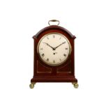 AN EARLY 19TH CENTURY MAHOGANY AND BRASS MOUNTED FUSEE BRACKET CLOCK the case surmounted by a pad