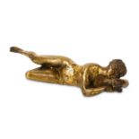 A SMALL 17TH CENTURY ITALIAN BRONZE OF A SLEEPING NYMPH  the reclining nude with ornate plaited