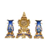 A SECOND QUARTER 19TH CENTURY FRENCH LOUIS PHILIPPE PERIOD PORCELAIN CLOCK GARNITURE SIGNED 'HONORE,