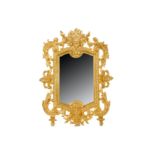 AN EARLY 20TH CENTURY GILT BRONZE LOUIS XVI STYLE TABLE MIRROR cast with scrolling foliage and