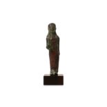 A 6TH CENTURY B.C. ETRUSCAN BRONZE KORE FIGURE raised on a later stained wood base,  the figure 10cm