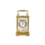A LATE 19TH CENTURY FRENCH GILT BRASS AND PORCELAIN MOUNTED CARRIAGE CLOCK BY RICHARD & CIE,