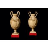 A FINE PAIR OF 19TH CENTURY DIEPPE IVORY VASES the baluster vases on circular feet over square