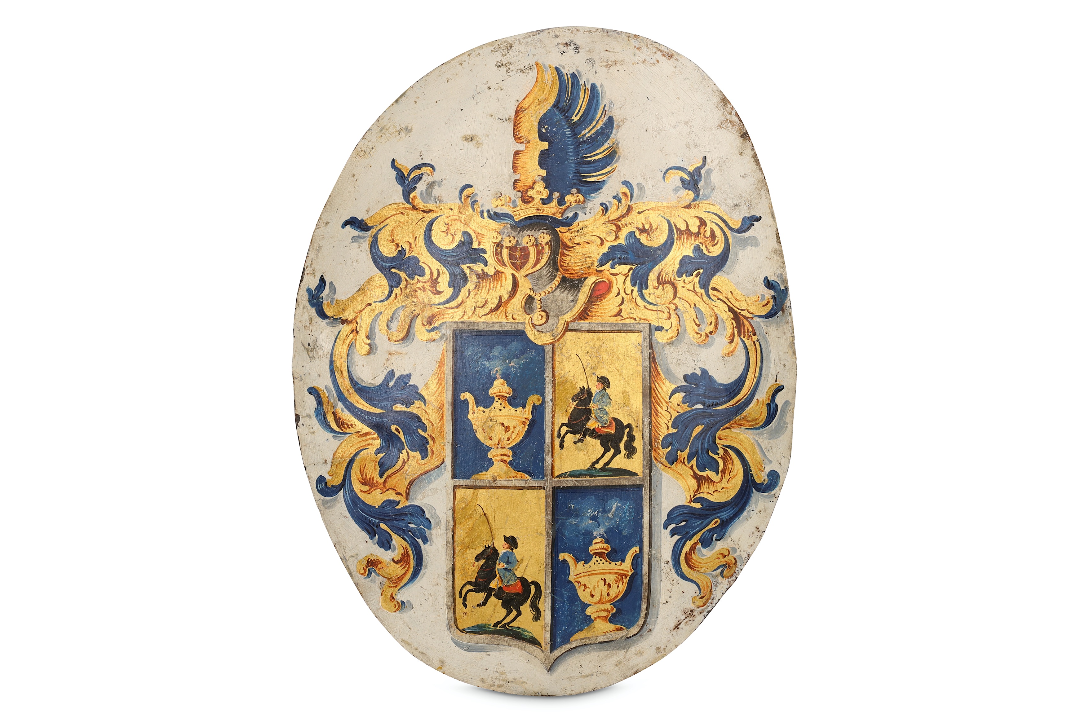 A MID 18TH CENTURY GERMAN OR DUTCH PAINTED METAL HERALDIC CREST painted and gilt decorated on a