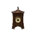 A LATE 19TH CENTURY FRENCH JAPONISME STYLE MAHOGANY, GILT BRASS AND IVORY INLAID MANTEL CLOCK the