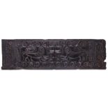 AN EARLY MEDIEVAL CARVED WOOD RELIEF PANEL DEPICTING LIONS probably a 13th / 14th century coffer