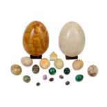 A COLLECTION OF SPECIMEN MINERAL EGGS in various hard stones and marbles including Algerian Onyx,